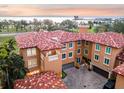 Waterfront property boasting a large, terracotta roofed building at 595 5Th Ne Ave, St Petersburg, FL 33701