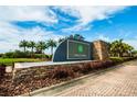 Cypress Creek community entrance sign with landscaping at 6834 Blue Moon Way, Sun City Center, FL 33573