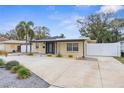 Well-maintained house with a clean design and a large yard at 1807 W Crawford St, Tampa, FL 33604