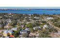 Aerial view of the neighborhood, showcasing waterfront property nearby at 229 Lime S Cir, Dunedin, FL 34698