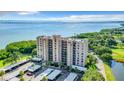 Luxury condo building with water and bridge views at 2616 Cove Cay Dr # 102, Clearwater, FL 33760