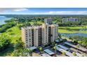 High-rise condo building near golf course and water at 2616 Cove Cay Dr # 102, Clearwater, FL 33760