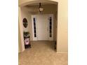 Bright entryway with tile flooring and a neutral color scheme at 2815 Holly Bluff Ct, Plant City, FL 33566