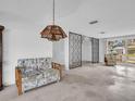 Living room with a vintage couch and decorative room divider at 3220 Salisbury Dr, Holiday, FL 34691