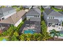 Screened-in pool and patio area in backyard at 5636 Silver Sun Dr, Apollo Beach, FL 33572