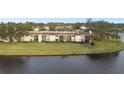 Aerial view of condo building near a lake at 130 Lakeview Way # 130, Oldsmar, FL 34677
