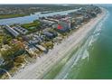 Aerial view showcasing beach front location at 19734 Gulf Blvd # 202, Indian Shores, FL 33785