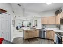 Galley kitchen with stainless steel appliances at 20922 Jaffa Ln, Land O Lakes, FL 34637
