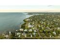 Wide shot of waterfront community, showcasing homes and water views at 608 Florida Blvd, Crystal Beach, FL 34681