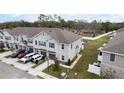 Aerial view of townhouse community with lush landscaping at 9642 Sweetwell Pl, Riverview, FL 33569