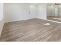 Bright living room with light wood floors and lots of natural light at 11882 104Th St, Largo, FL 33773