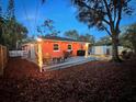 Backyard patio with string lights and seating area at 1530 Rollen Rd, Clearwater, FL 33755