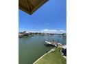 Stunning view of the waterway, boats and other homes at 160 174Th Terrace E Dr # B, Redington Shores, FL 33708