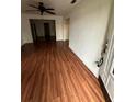 Living room with hardwood floors and ceiling fan at 3504 E 22Nd Ave, Tampa, FL 33605