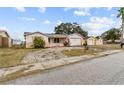 Charming ranch home with a brick facade and a spacious yard at 7051 Nova Scotia Dr, Port Richey, FL 34668