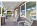 Relaxing front porch with two chairs, perfect for enjoying the outdoors at 2912 N 16Th St # 1/2, Tampa, FL 33605