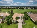 One story house with driveway and golf course view at 34303 Sahalee Loop, Dade City, FL 33525