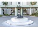 San Sea II building entrance with fountain at 3820 Gulf Blvd # 203, St Pete Beach, FL 33706