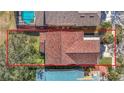 Aerial view showcasing the home's roofline and backyard at 11616 Crest Creek Dr, Riverview, FL 33569