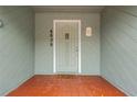 Quaint front door entrance with a terracotta tile stoop at 4606 Ridgecliff Dr, Brandon, FL 33511