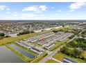 Aerial view showcasing community and water features at 7014 Summer Holly Pl, Riverview, FL 33578
