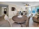 Charming dining area with round table and four chairs at 100 Oakmont Ln # 602, Belleair, FL 33756