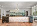 Lobby with backlit onyx reception desk at 2910 W Barcelona St # 2102, Tampa, FL 33629