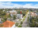 Aerial view of a house and neighborhood, showcasing the property's location and surroundings at 418 S Albany Ave, Tampa, FL 33606