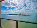 Stunning ocean view from a condo balcony, showcasing a bridge and cityscape at 450 Gulfview S Blvd # 1708, Clearwater, FL 33767