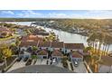 Aerial view of waterfront townhouses with garages and water access at 6320 Grand Bahama Cir # 6320, Tampa, FL 33615