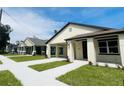 New construction homes with street view and landscaping at 5701 N 20Th St, Tampa, FL 33610