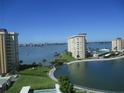 Aerial view of waterfront condos with a lagoon at 4575 Cove Cir # 904, Madeira Beach, FL 33708