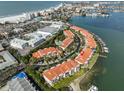 Aerial view showing location of townhouse community near water at 4625 Mirabella Ct, St Pete Beach, FL 33706