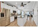 Modern kitchen with stainless steel appliances and granite countertops at 5716 Colony Glen Rd, Lithia, FL 33547