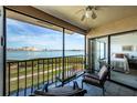 Spacious lanai with water view and seating at 6218 Palma Del Mar S Blvd # 208, St Petersburg, FL 33715