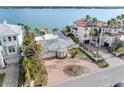 Single story home with metal roof and brick driveway at 11325 9Th E St, Treasure Island, FL 33706