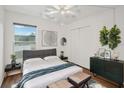 Comfortable bedroom with hardwood floors and ample closet space at 1799 N Highland Ave # 136, Clearwater, FL 33755