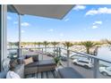 Spacious balcony overlooking marina with seating area and water views at 5120 Marina Way # 2208, Tampa, FL 33611