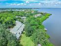 Aerial view of waterfront community with lush landscaping and private docks at 1111 N Bayshore Blvd # B7, Clearwater, FL 33759