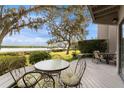 Deck patio overlooking waterfront with seating for relaxing at 1111 N Bayshore Blvd # B7, Clearwater, FL 33759