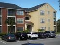 Apartment building entrance with parking spaces at 11901 4Th N St # 10105, St Petersburg, FL 33716