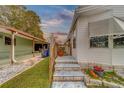 Mobile home exterior, showing side view and steps at 148 Gull Aire Blvd, Oldsmar, FL 34677