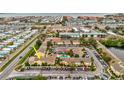 Aerial view showing townhome community and location at 1505 Chateaux De Ville Ct, Clearwater, FL 33764