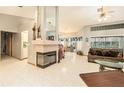 Living room with a fireplace and an open floor plan at 6009 County Line Rd, Spring Hill, FL 34606