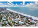 Aerial view of a house close to beach at 809 Mandalay Ave, Clearwater Beach, FL 33767