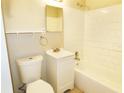 Clean bathroom with white tile, bathtub, and vanity at 10591 116Th Ter, Largo, FL 33773