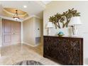 Bright and spacious entryway with decorative console table at 1200 Gulf Blvd # 102, Clearwater Beach, FL 33767