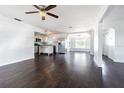 Open concept kitchen with island and stainless steel appliances at 3709 W Oklahoma Ave, Tampa, FL 33611