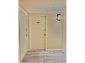 Simple condo entry with light wood floors at 450 S Gulfview Blvd # 408, Clearwater Beach, FL 33767