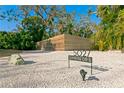 Modern front yard with gravel landscaping and house number at 5027 Sunrise S Dr, St Petersburg, FL 33705